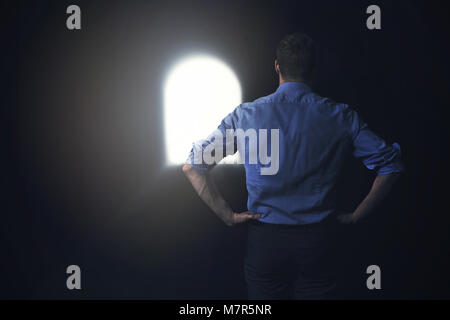 businessman sees the light at the end of the tunnel Stock Photo