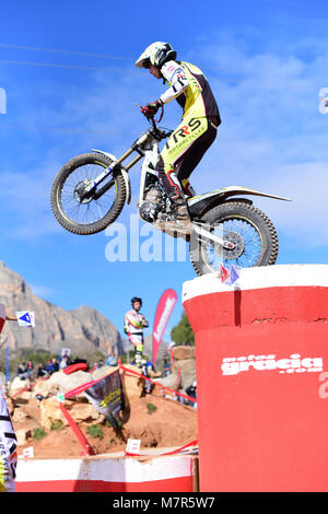 LA NUCIA, SPAIN - FEBRUARY 11th 2018: Unknown rider masters an obstacle at the Spanish National Trial Championship. Stock Photo