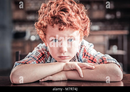 Nice red haired boy looking at you Stock Photo