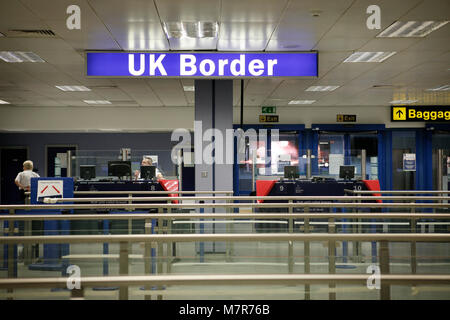 Passport control. HM UK Border Agency, Manchester Airport. Stock Photo