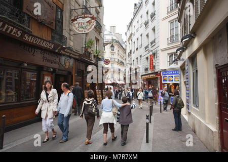 Paris, France - May 09, 2009. Visitors outside Rue Saint Severin in Little Athens, the Latin Quarter. Stock Photo