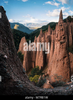 Earth pyramids with stones on top in Renon Ritten region, South Tyrol, Italy. Stock Photo