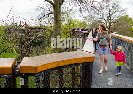 London, UK - April 18, 2014. Treetop Walkway at Kew Botanic Gardens. The walkway allows visitors to walk through 200 metres of forest canopy Stock Photo