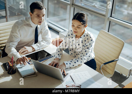Top view of young colleagues developing new project concept Stock Photo