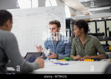 Team working on robotics project Stock Photo