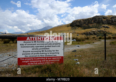 Notice at the start of the track up to Mount Sunday ( Edoras in Lord of the Rings). The idea is to stop this beautiful area being swamped by tourists. Stock Photo