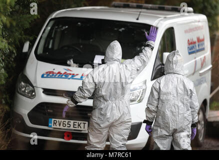 Investigators in protective clothing remove a van from an address in Winterslow near Salisbury in Wiltshire, as police and members of the armed forces continue to investigate the suspected nerve agent attack on Russian double agent Sergei Skripa. Stock Photo