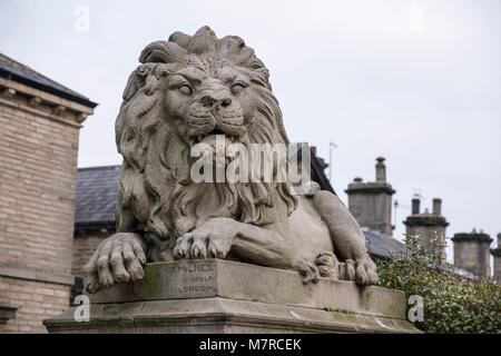 Stone carving of a Lion outside Victoria Hall, Saltaire model village, Bradford, West Yorkshire, England Stock Photo