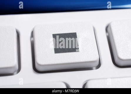 Macro Of A White Stop Button Of A White Remote Control For A Hifi Stereo Audio System Stock Photo