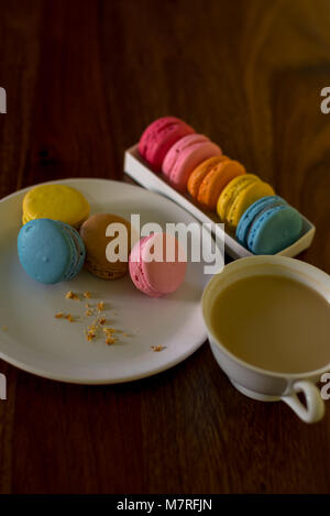 Delicious macaroons on the wooden table, with copy space Stock Photo