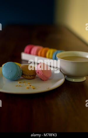 Delicious macaroons on the wooden table, with copy space Stock Photo