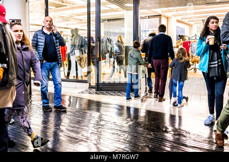 New York City, USA - October 30, 2017: Market food clothing shop interior inside in downtown lower Chelsea neighborhood district Manhattan NYC, people Stock Photo