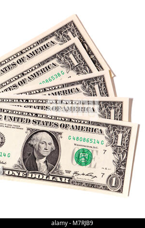 Untidy fan of US one dollar bills isolated against white. Stock Photo