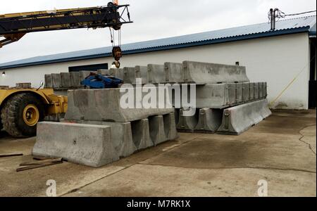 Concrete materials testing finishing bridge deck inspection cylinder strengths concrete barrier precast drainage drop box armored edge construction Stock Photo