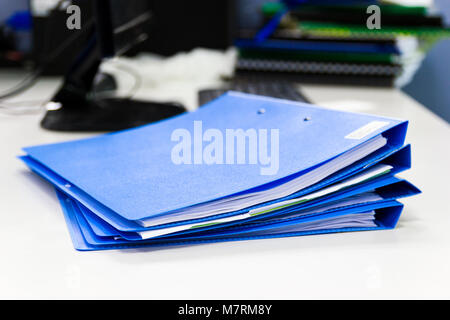 file folder and Stack of business report paper file  on desk in office, business concept. Stock Photo