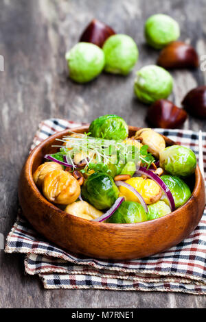 Christmas  meal with brussels sprouts and roasted chestnuts Stock Photo