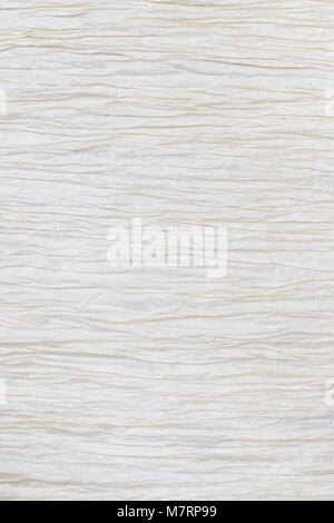 Bright crepe paper with a light ocher tone Stock Photo