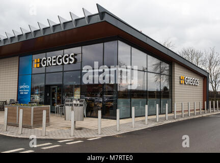 The exterior of a modern store outlet for Greggs The Baker which supplies baked goods and drinks to British consumers Stock Photo