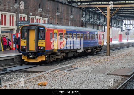 An East Midlands Trains Class 153 diesel train at Stoke On Trent station running  a service to Crewe Stock Photo