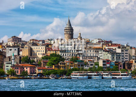 Istanbul city skyline in Turkey, view from Golden Horn, houses in Beyoglu district with Galata tower in the midlle. Stock Photo