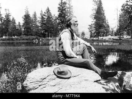 John Muir (1838-1914), portrait of the Scottish-American naturalist who is credited with being the 'Father of the National Parks', c.1902. Stock Photo