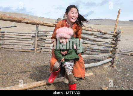 Hatgal, Mongolia, 3rd March 2018: mongolian kids in a steppe of northern Mongolia Stock Photo