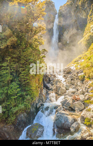 Stunning view of Devils Punchbowl Waterfall, One of the most favorite Attractions on the Arthur's Pass road trip Canterbury-Christchurch, South Island Stock Photo