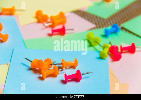 Stationary, Pushpins Heap on Blank Colored Sticker. Time-management, Planning. Stock Photo