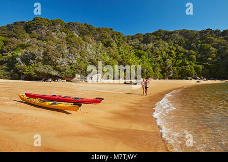 Kayaks and campsite, Te Pukatea Bay, Abel Tasman National Park, Nelson Region, South Island, New Zealand Stock Photo