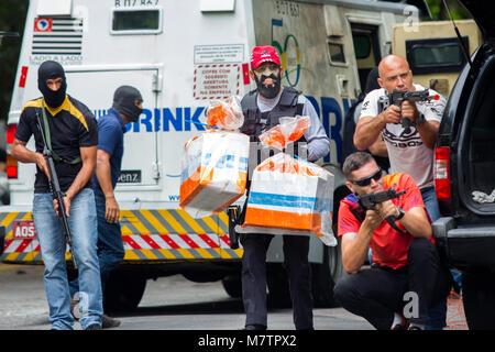 March 12, 2018 - Sao Paulo, Sao Paulo, Brazil - ROTA police (elite group of Brazilian police) demonstrates the combat action during robbery simulation of an armored car carrying money in Sao Paulo, Brazil. (Credit Image: © Paulo Lopes via ZUMA Wire) Stock Photo