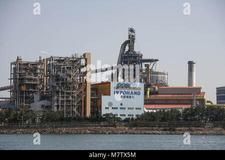 March 13, 2018 - Pohang, GYEONGBUK, SOUTH KOREA - March 13, 2018-Pohang, South Korea-A General view of POSCO Steel Plant at Pohang steel industrial complex in Pohang, South Korea. China's steel mills, a target of President Donald Trump's ire, are the industry's 800-pound gorilla: They supply half of the world's output, so their every move has a global impact. The steel industry swelled over the past decade to support a history-making Chinese construction boom. Once that tailed off, the country was left with a glut of half-idle, money-losing mills. (Credit Image: © Ryu Seung Il via ZUMA Wire) Stock Photo