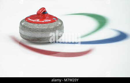 PyeongChang, South Korea. 13th March, 2018. A curling stone of the United States is seen during the match between the United States and China at the mixed round robin session 10 of wheelchair curling at the 2018 PyeongChang Winter Paralympic Games at PyeongChang, South Korea, March 13, 2018. (Xinhua/Xia Yifang) Credit: Xinhua/Alamy Live News Stock Photo