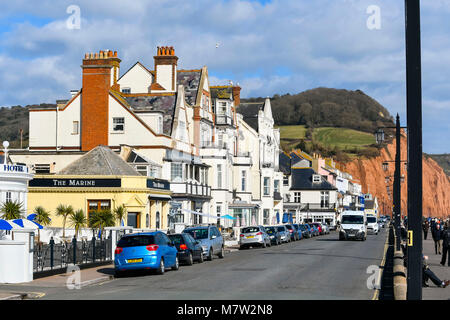 Sidmouth, Devon, UK.  13th March 2018.  UK Weather.  The seafront at the seaside town of Sidmouth in Devon on a warm sunny spring afternoon.  Picture Credit: Graham Hunt/Alamy Live News. Stock Photo