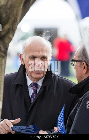 London, UK. 13th March, 2018. Sir Vince Cable, Leader of the Liberal Democrats, talks to pro-Europe protesters from SODEM opposite the Houses of Parliament. According to a report in today's Express newspaper, Sir Vince Cable has been reported to the police for hate speech following his controversial address on Brexit at the weekend. Credit: Mark Kerrison/Alamy Live News Stock Photo