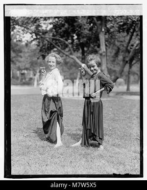 Girls dressed as adults, posing with cigarettes), 8-31-23 LOC npcc.09390 Stock Photo