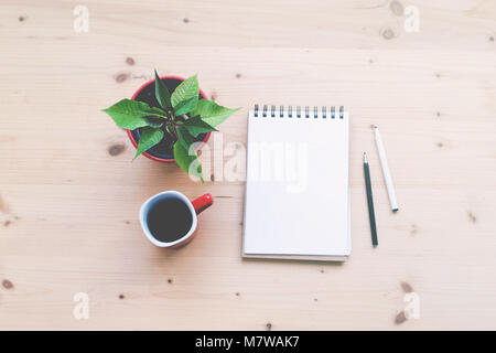 Still Life with Flower (Poinsettia), Sketchbook and Cup with Black Coffee. Stock Photo