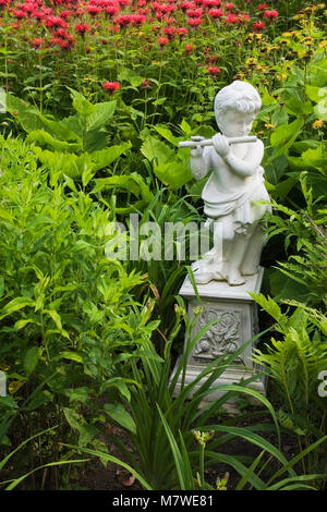 Sculpture of a boy playing the flute in Batumi. Sculpture of a child ...