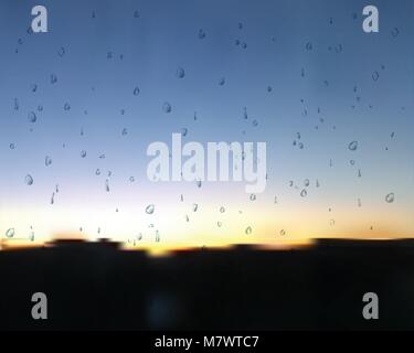 Weather after rain. Sunset vector. Water drops on glass. Spray at sundown. Realistic raindrop. Stock Vector