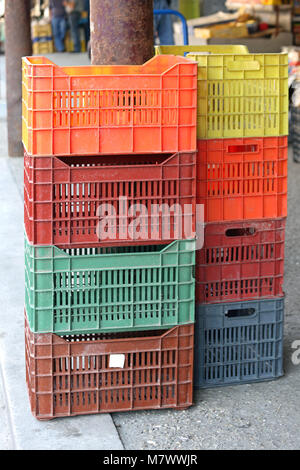 Stackable Plastic Crates for Produce at Farmers Market Stock Photo