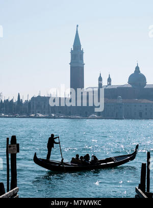 Venice, Italy: San Giorgio Maggiore, with a gondoliere in front Stock Photo