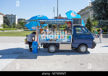MILAN, ITALY, JUNE, 7, 2017 - A small van sells drinks and ice creams on the streets of center of Milan, Italy. Stock Photo