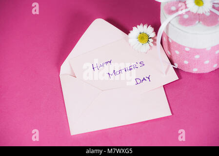 Happy mother's day greeting card on pink background Stock Photo