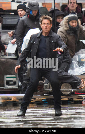 Tom Cruise keeps dry while filming Mission Impossible in London.  In these scenes he can be seen running from an unknown assailant.  Featuring: Tom Cruise Where: London, United Kingdom When: 10 Feb 2018 Credit: WENN.com Stock Photo