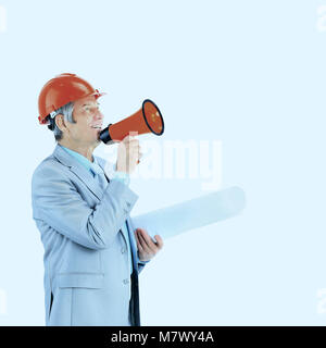 experienced architect with drawings yelling at the top in the horn. Stock Photo