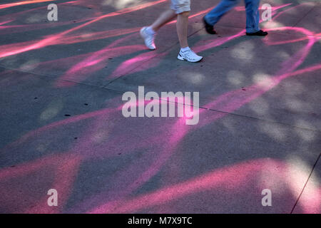 WASHINGTON - People walking through the colorful reflections from the walls of the Museum of Pop Culture at the Seattle Center in downtown Seattle. Stock Photo