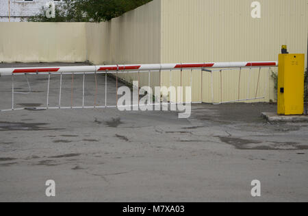 Automatic Gate Barrier Parking sign Building Entrance access security system Stock Photo