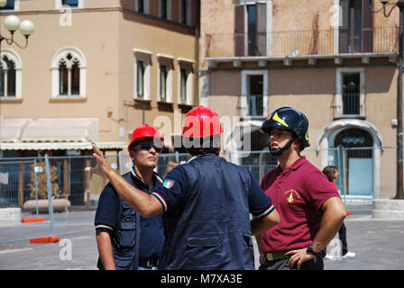 Firefighters plan to put in safety buildings damaged after the earthquake - L'aquila, Italy. © Antonio Ciufo Stock Photo