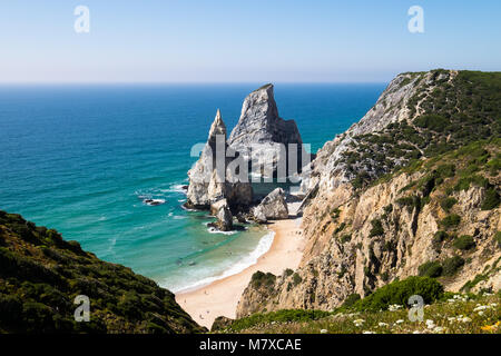 Hike down to Praia da Ursa beach on a sunny day, Portugal Stock Photo