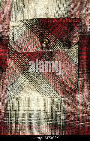 A close up of a Red flannel shirt pocket Stock Photo