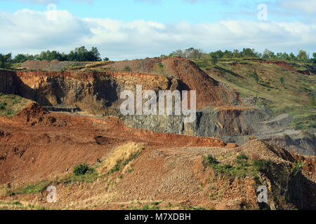 A Rock Quarry dug out mountain side Stock Photo